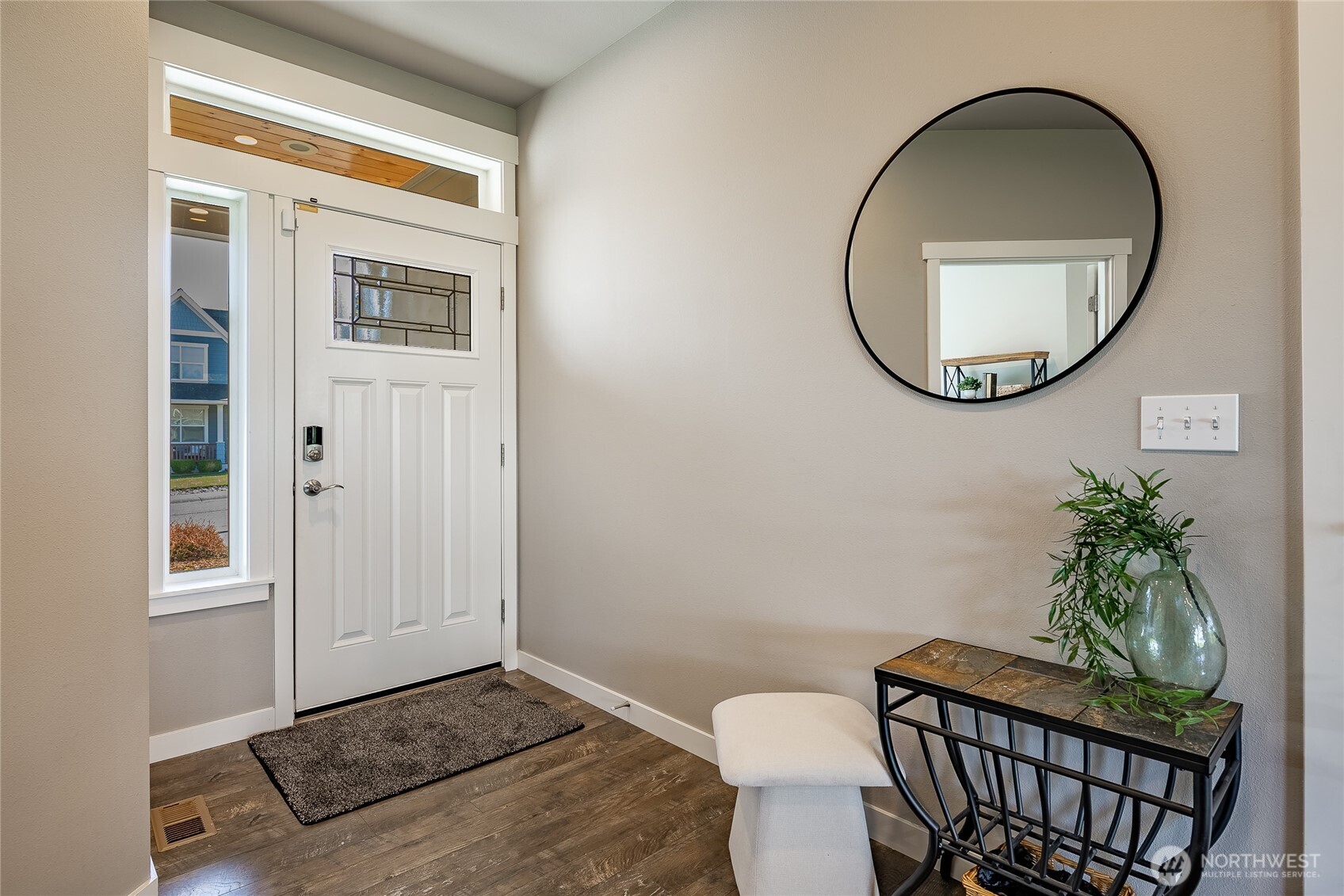 5319 Coastal Loop Blaine, WA 98230 - Photo 3 of 40 a view of a hallway with a mirror and a potted plant