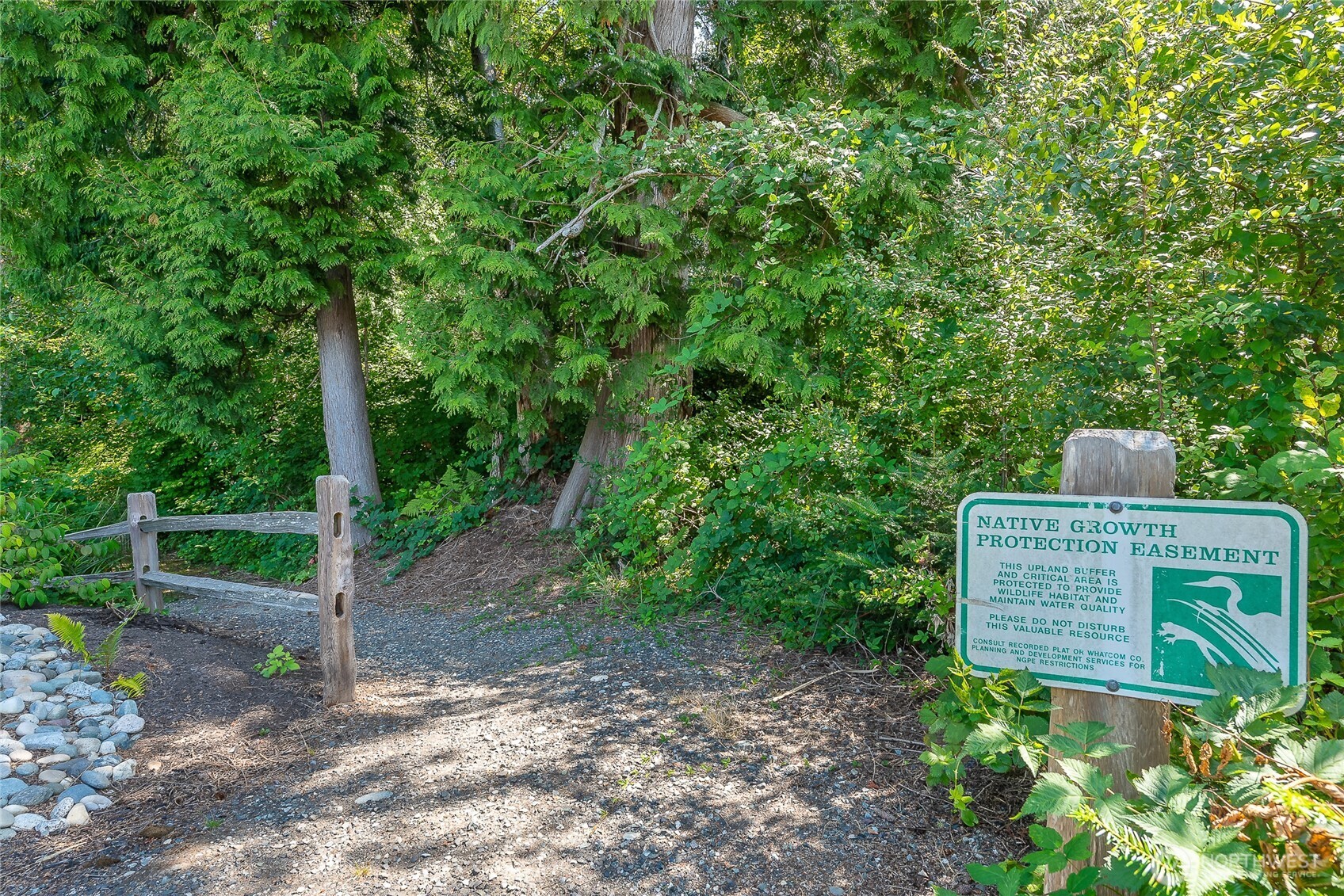5319 Coastal Loop Blaine, WA 98230 - Photo 34 of 40 a view of a wooden fence and trees