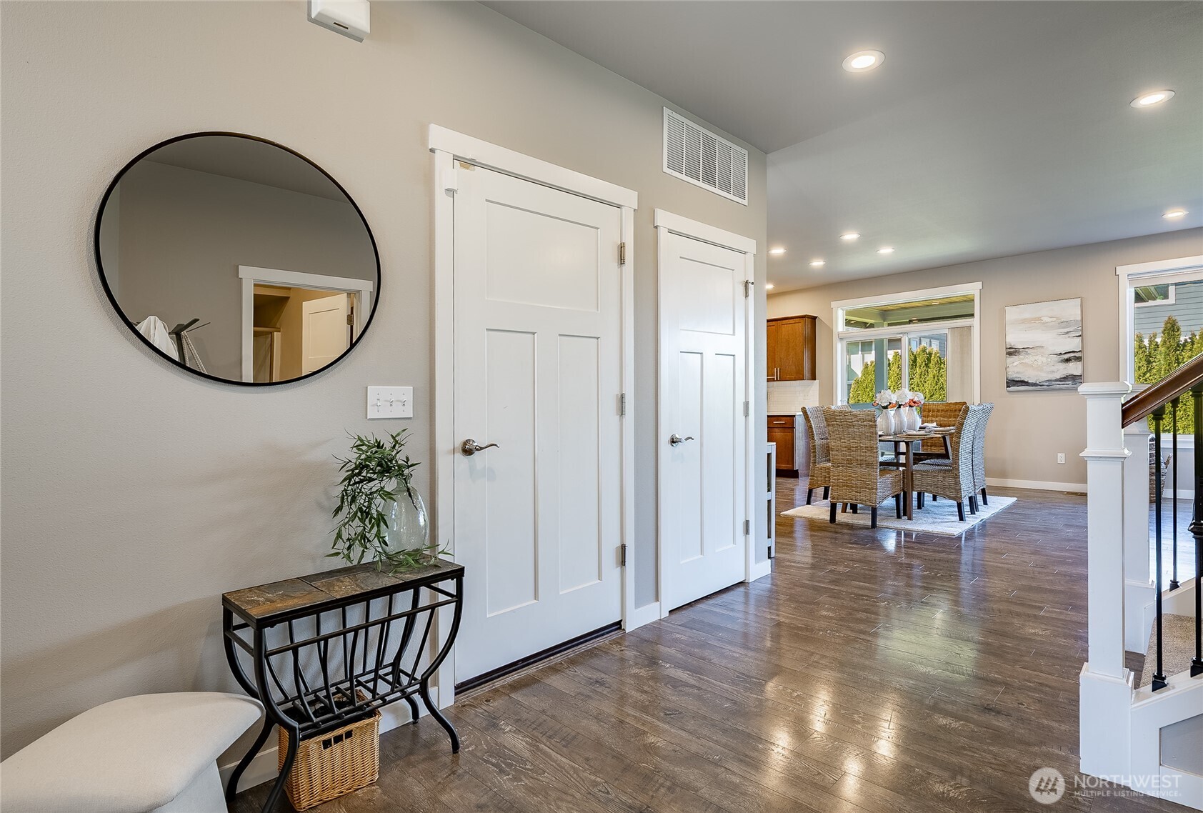 5319 Coastal Loop Blaine, WA 98230 - Photo 4 of 40 a dining room with furniture potted plants and wooden floor