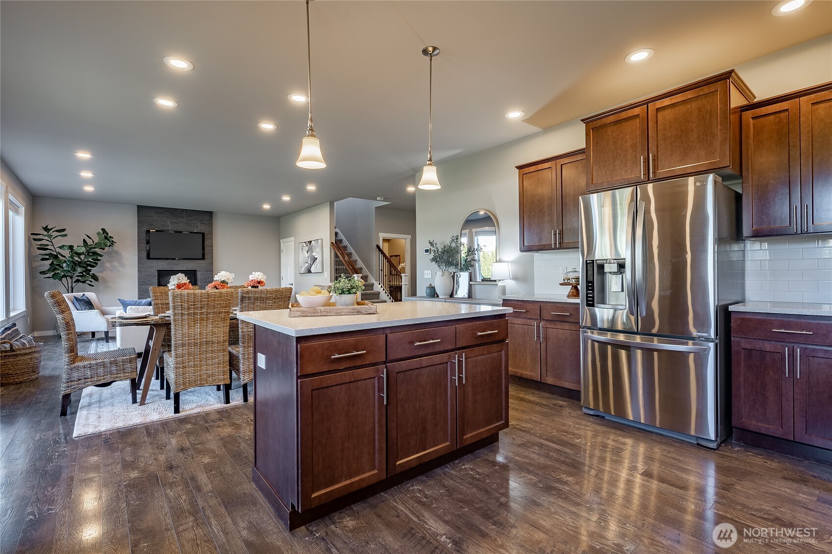 5319 Coastal Loop Blaine, WA 98230 - Photo 10 of 40 a kitchen with kitchen island granite countertop wooden cabinets and stainless steel appliances