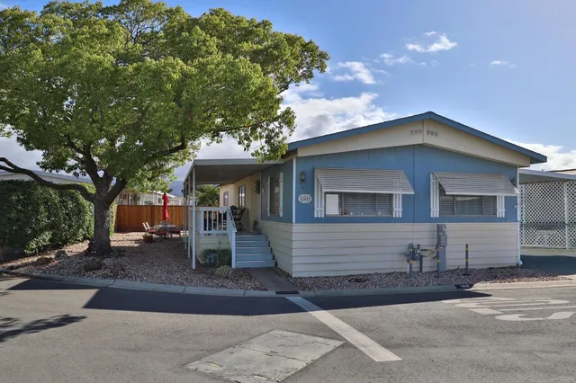 a front view of a house with garage