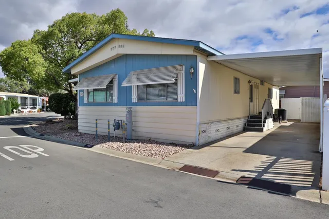 a white house with a outdoor space