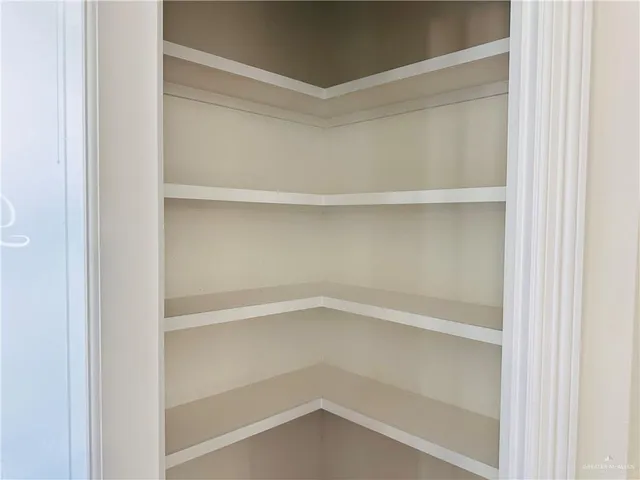 a empty closet with white paint