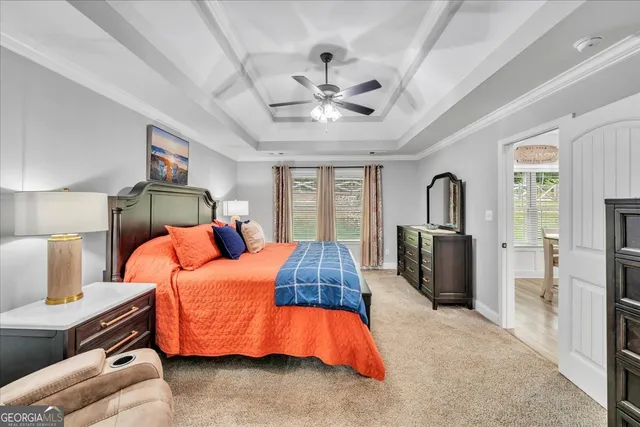 a bathroom with a double vanity sink mirror and shower