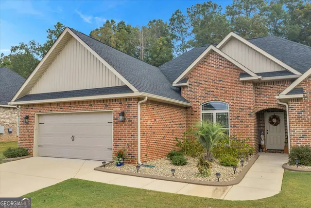 a view of a house with garage