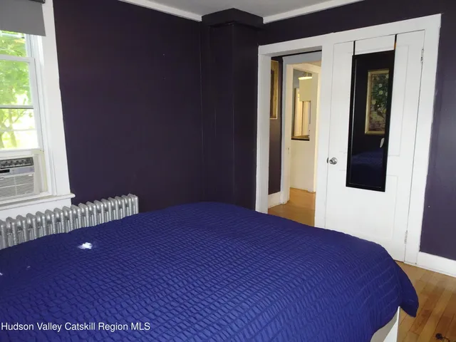 a bathroom with a shower and toilet