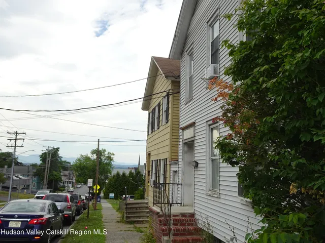 a house view with a garden space
