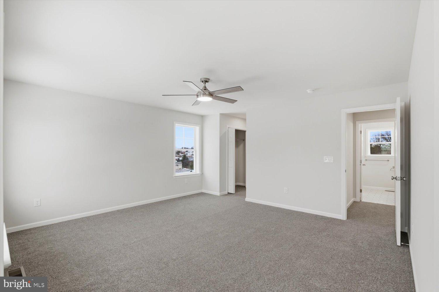 228 Hockersville Road Hershey, PA 17033 - Photo 19 of 36 a view of a big room with windows and chandelier fan