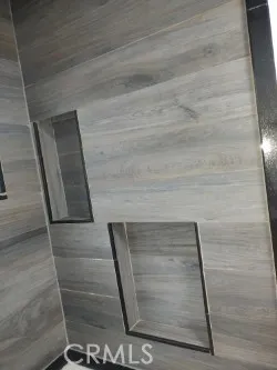 a view of staircase with white walls