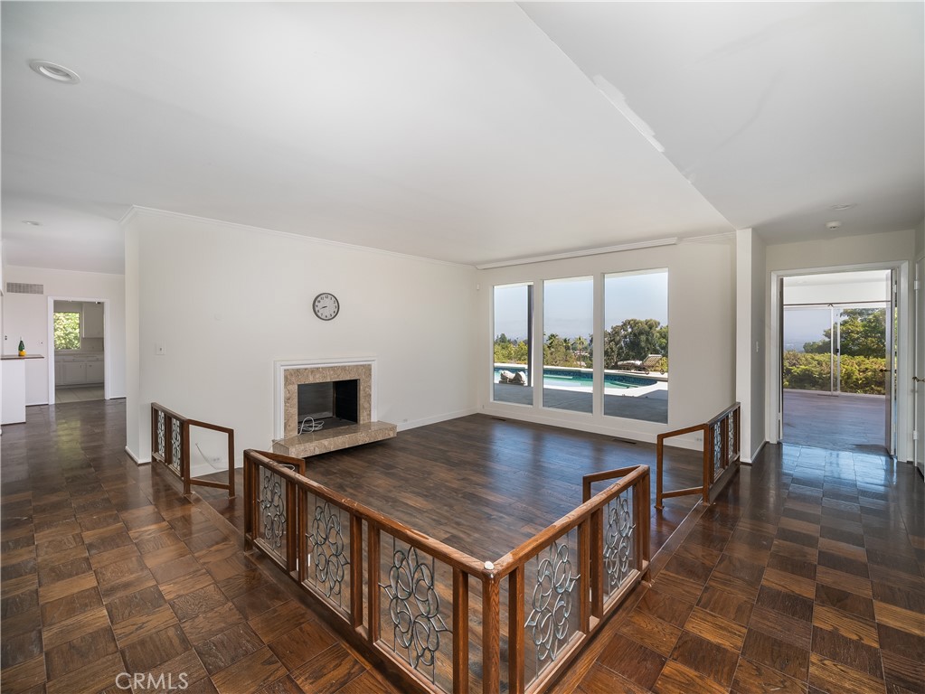 20193 Adele Drive Woodland Hills, CA 91364 - Photo 14 of 38 a view of a dining room with furniture window and wooden floor