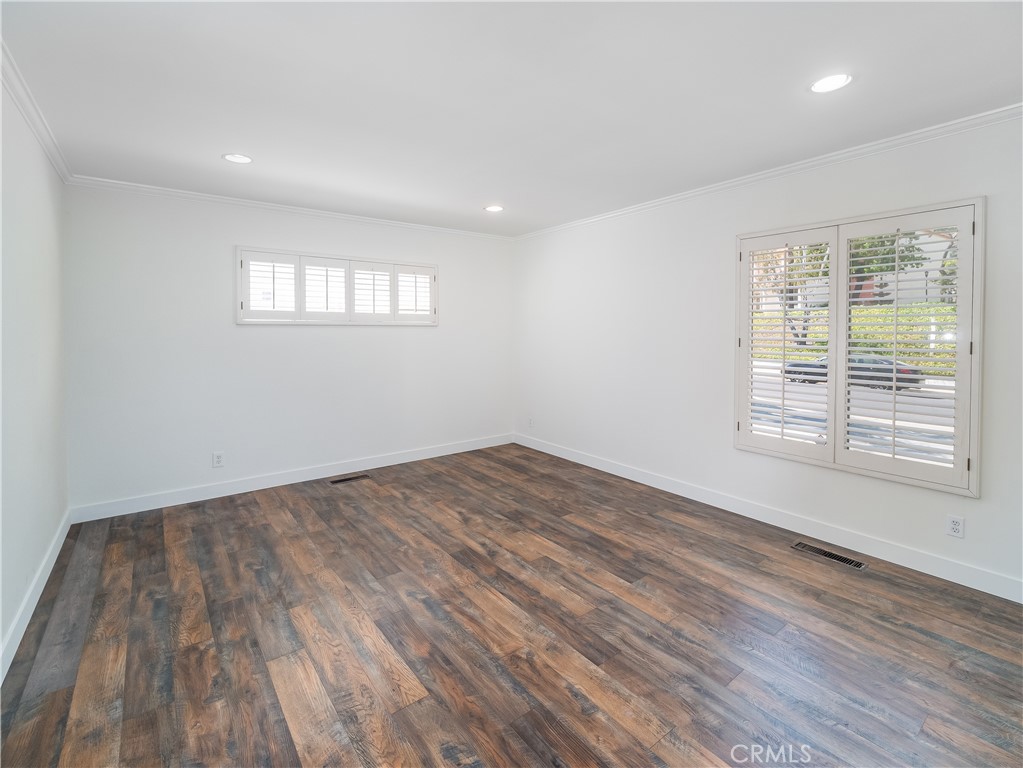20193 Adele Drive Woodland Hills, CA 91364 - Photo 19 of 38 a view of empty room with wooden floor and fan