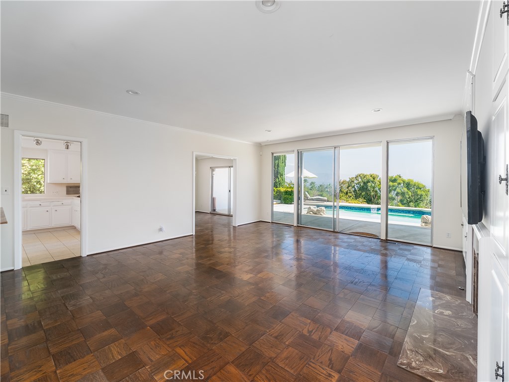20193 Adele Drive Woodland Hills, CA 91364 - Photo 3 of 38 a view of an empty room with a window