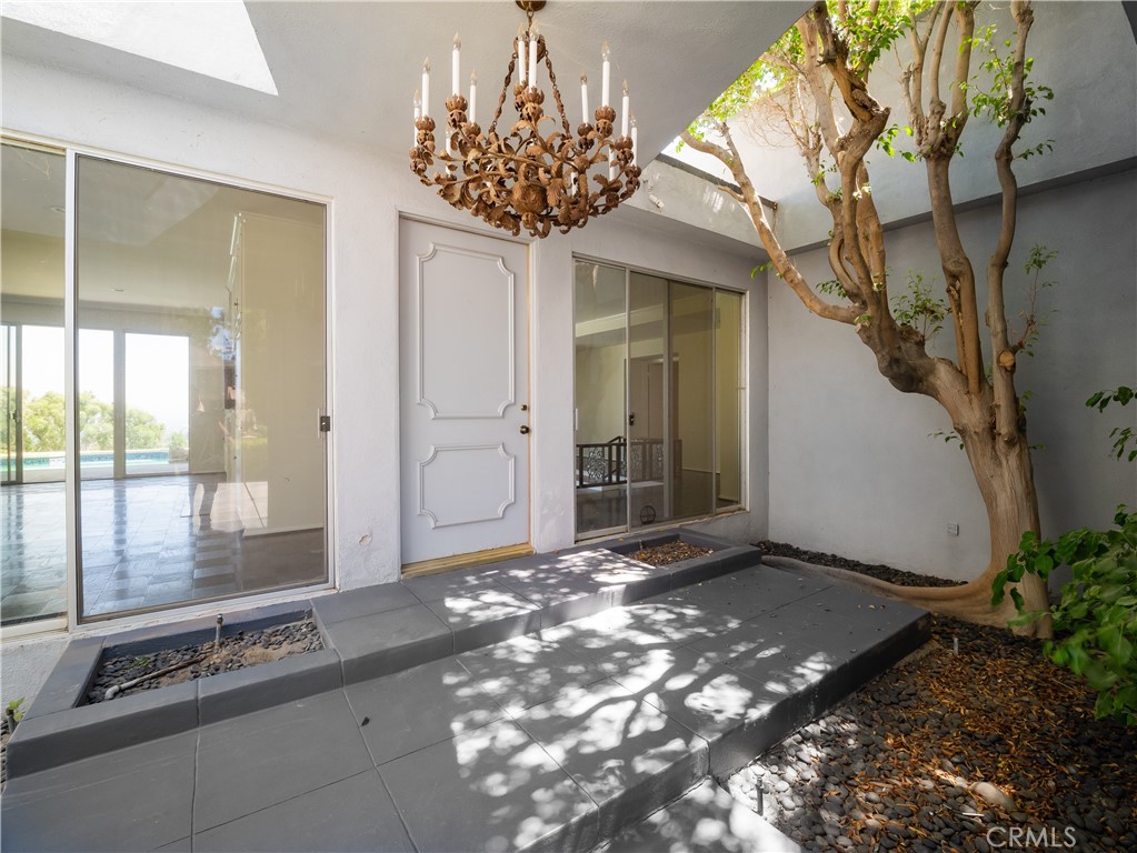 20193 Adele Drive Woodland Hills, CA 91364 - Photo 33 of 38 a view of a entrance door of the house