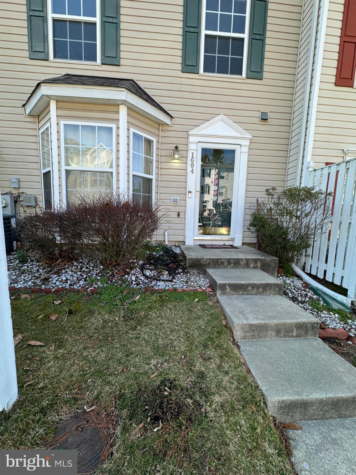 Charming entrance with inviting curb appeal.