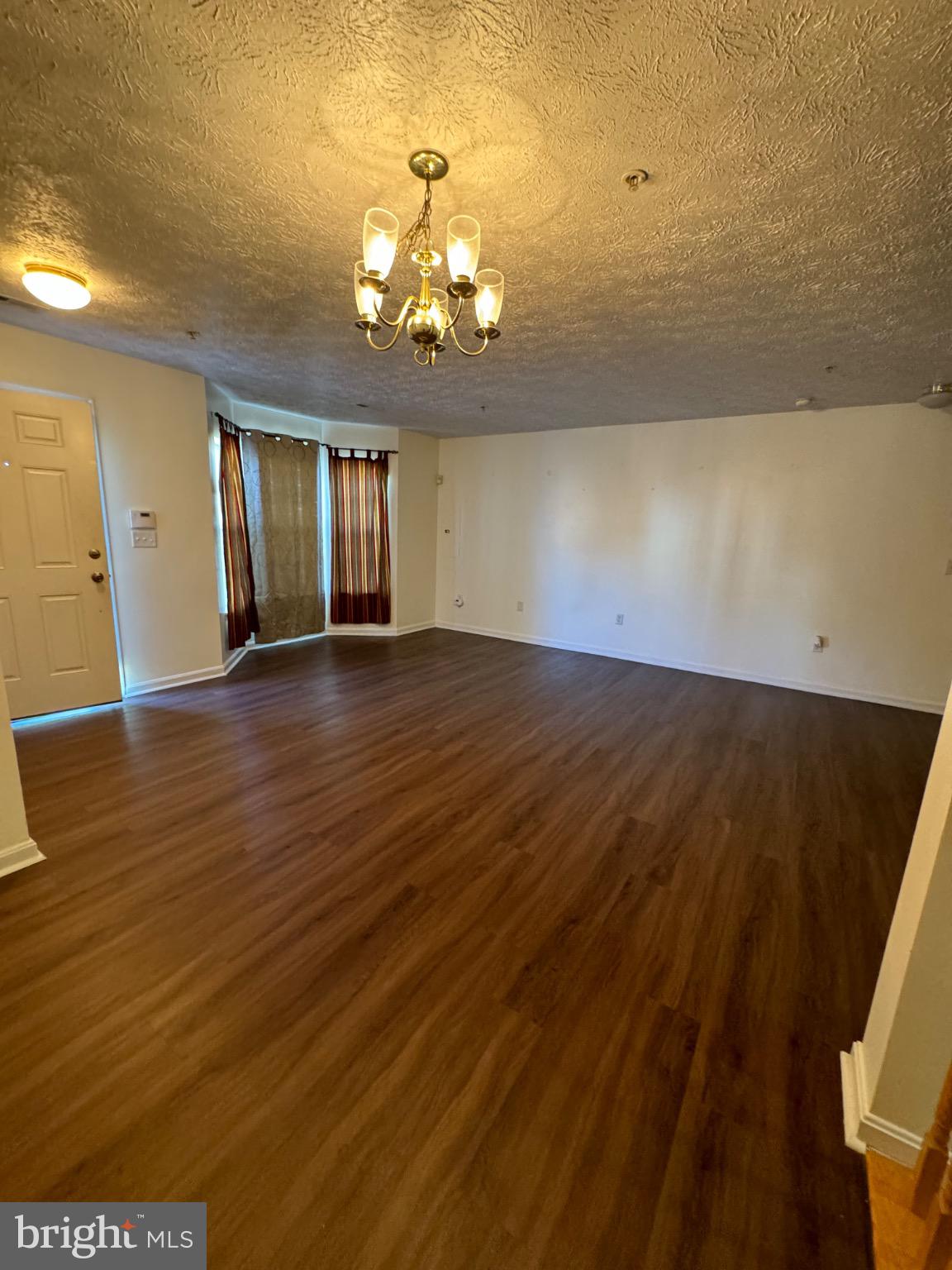 1604 Briarview Court, Unit 64 Severn, MD 21144 - Photo 19 of 24 Spacious room with elegant lighting.