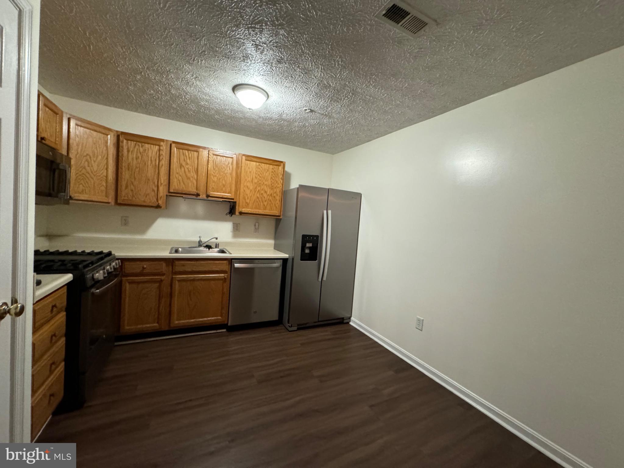 1604 Briarview Court, Unit 64 Severn, MD 21144 - Photo 20 of 24 Modern kitchen with sleek appliances.