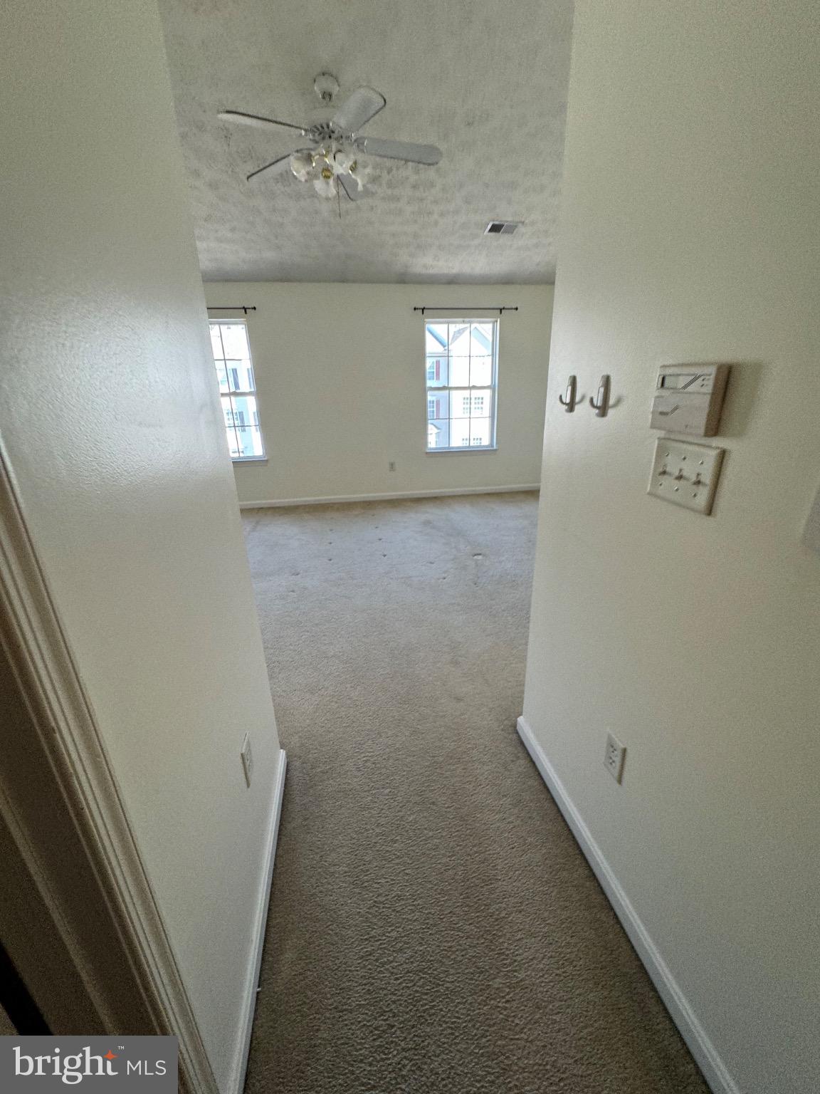 1604 Briarview Court, Unit 64 Severn, MD 21144 - Photo 9 of 24 Spacious entryway leading to bright living area.