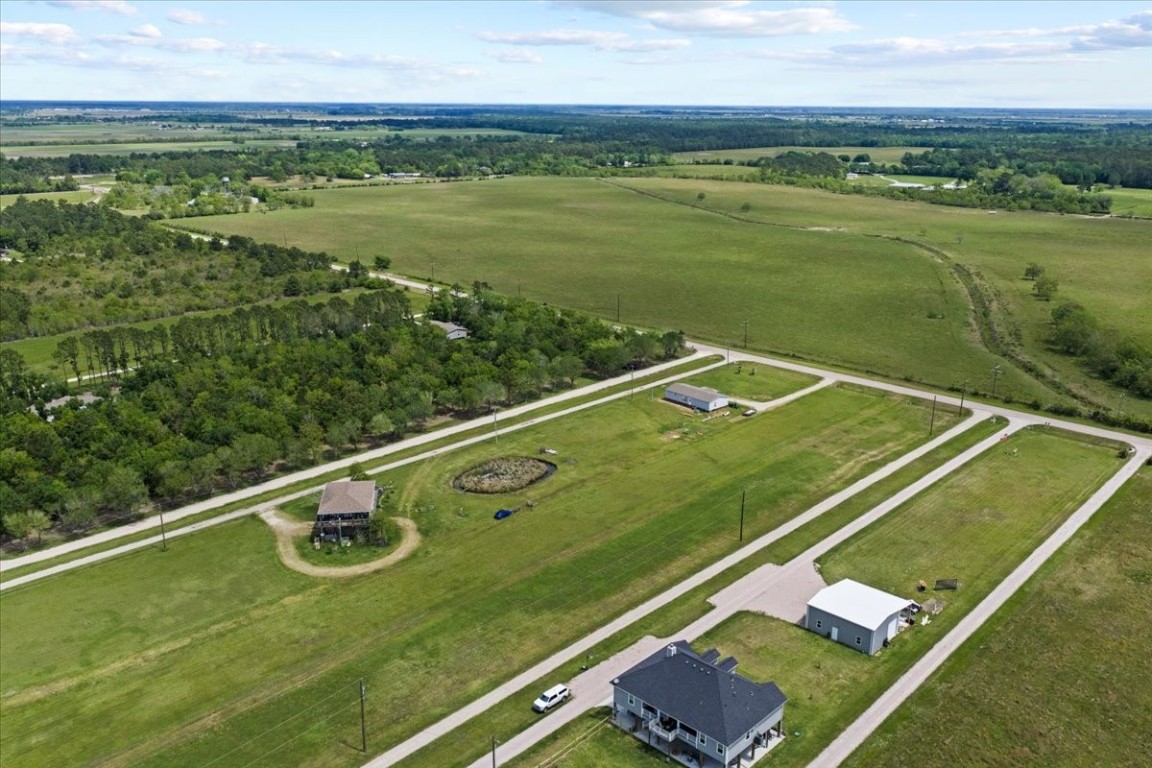 4409 West Bayshore Road Anahuac, TX 77514 - Photo 10 of 15 a view of a tennis court