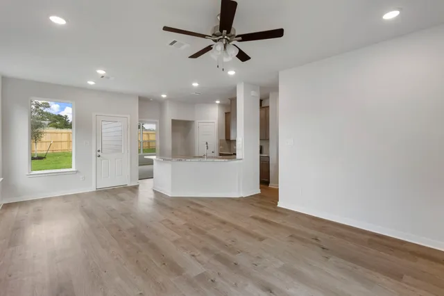 a view of an empty room and window