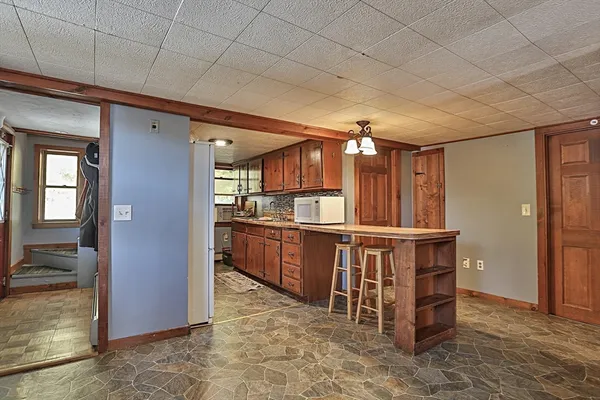 a view of kitchen with dining area