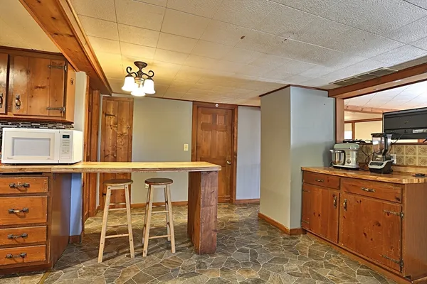 a view of a kitchen with breakfast area