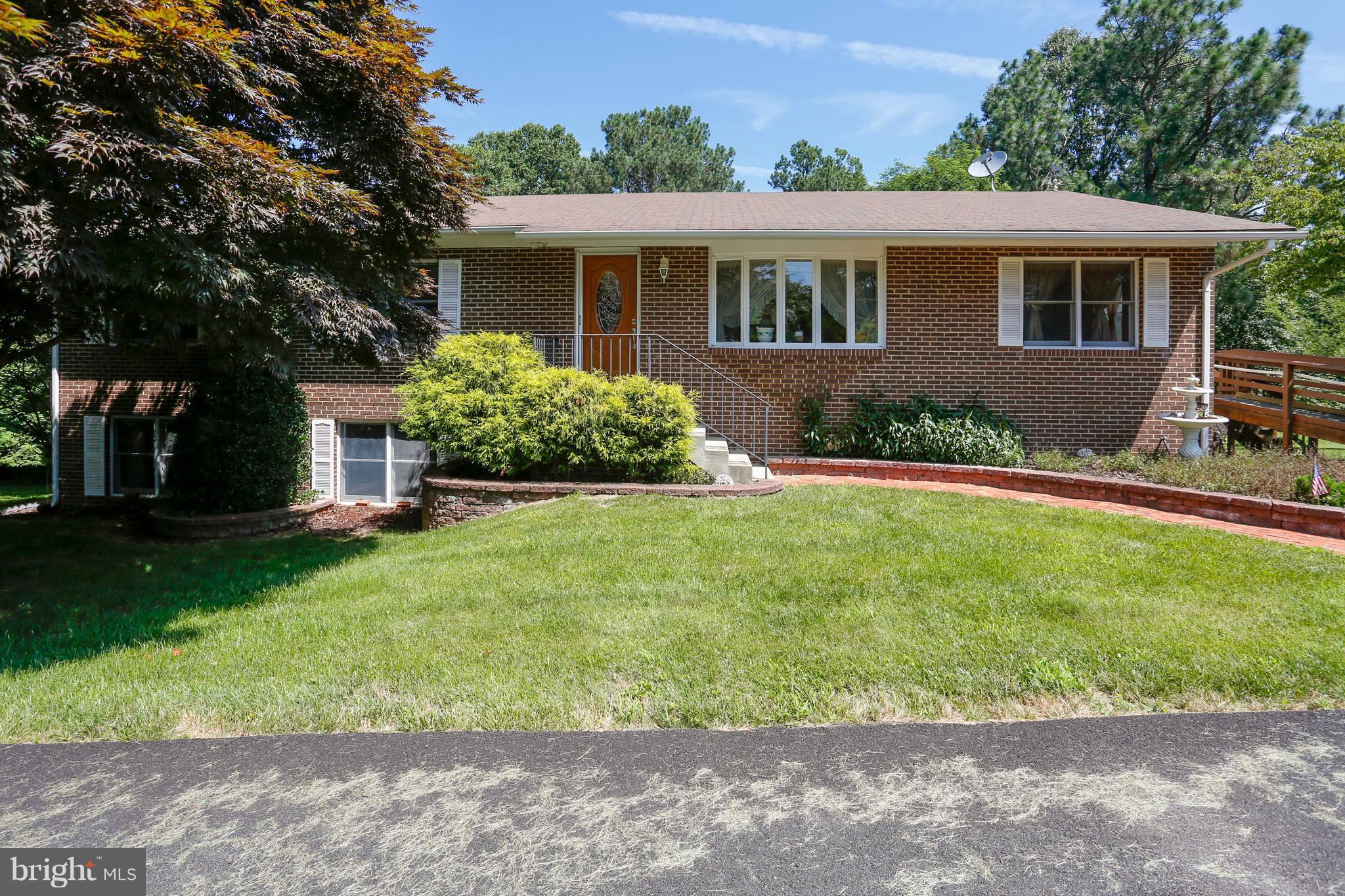464 Friendship Road Friendship, MD 20758 - Photo 1 of 29 a front view of house with yard and green space