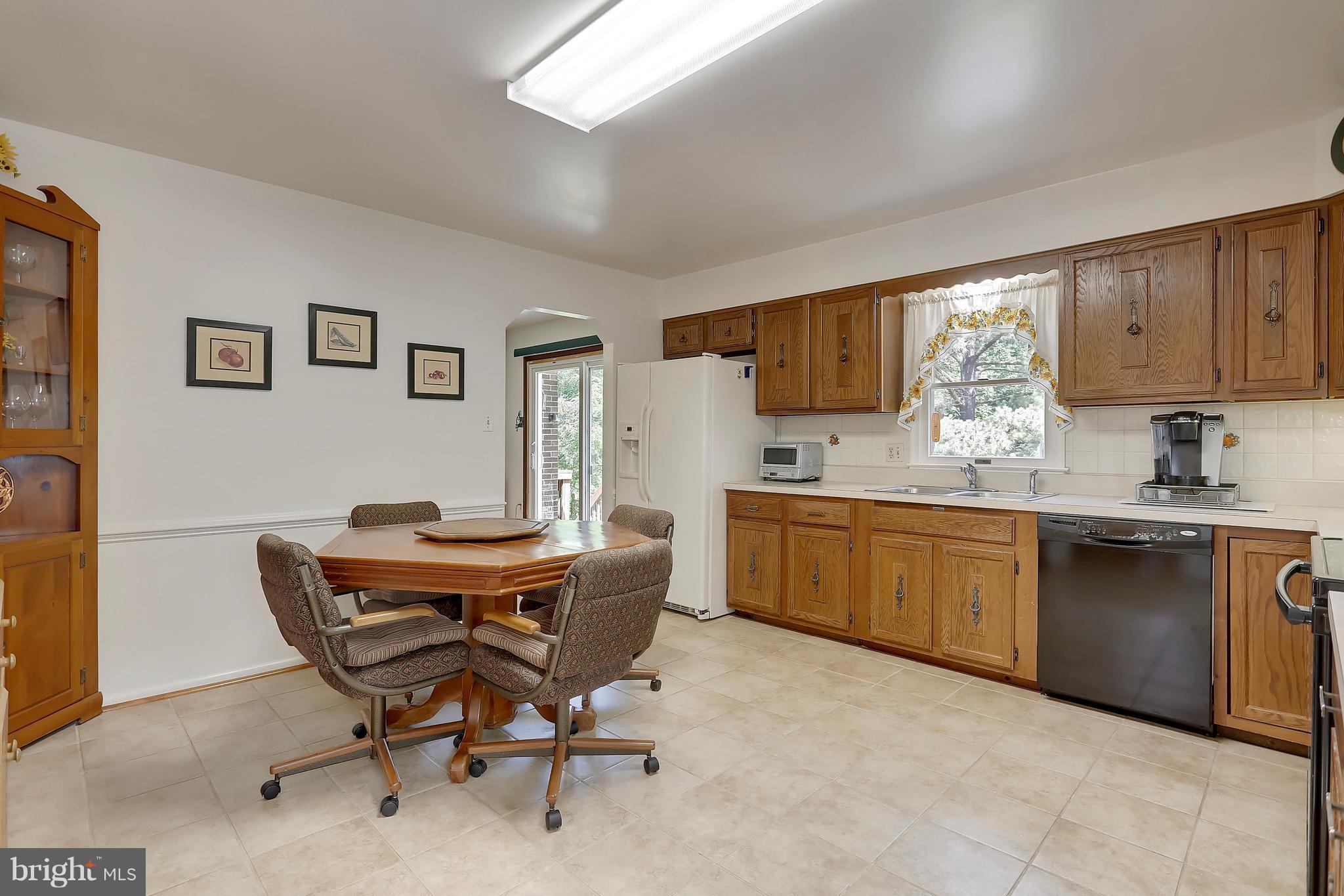 464 Friendship Road Friendship, MD 20758 - Photo 13 of 29 a living room with stainless steel appliances kitchen island granite countertop furniture and a window
