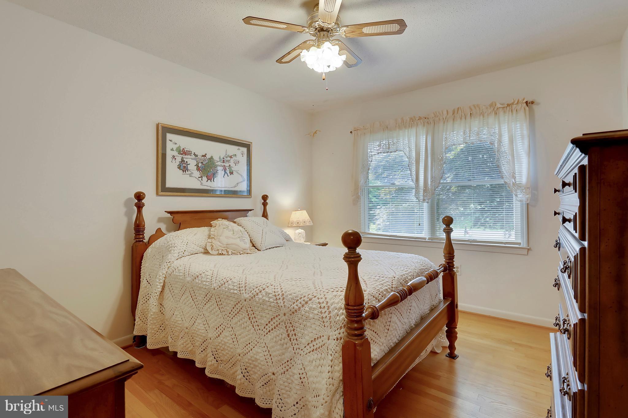 464 Friendship Road Friendship, MD 20758 - Photo 15 of 29 a bed room with a bed and a window
