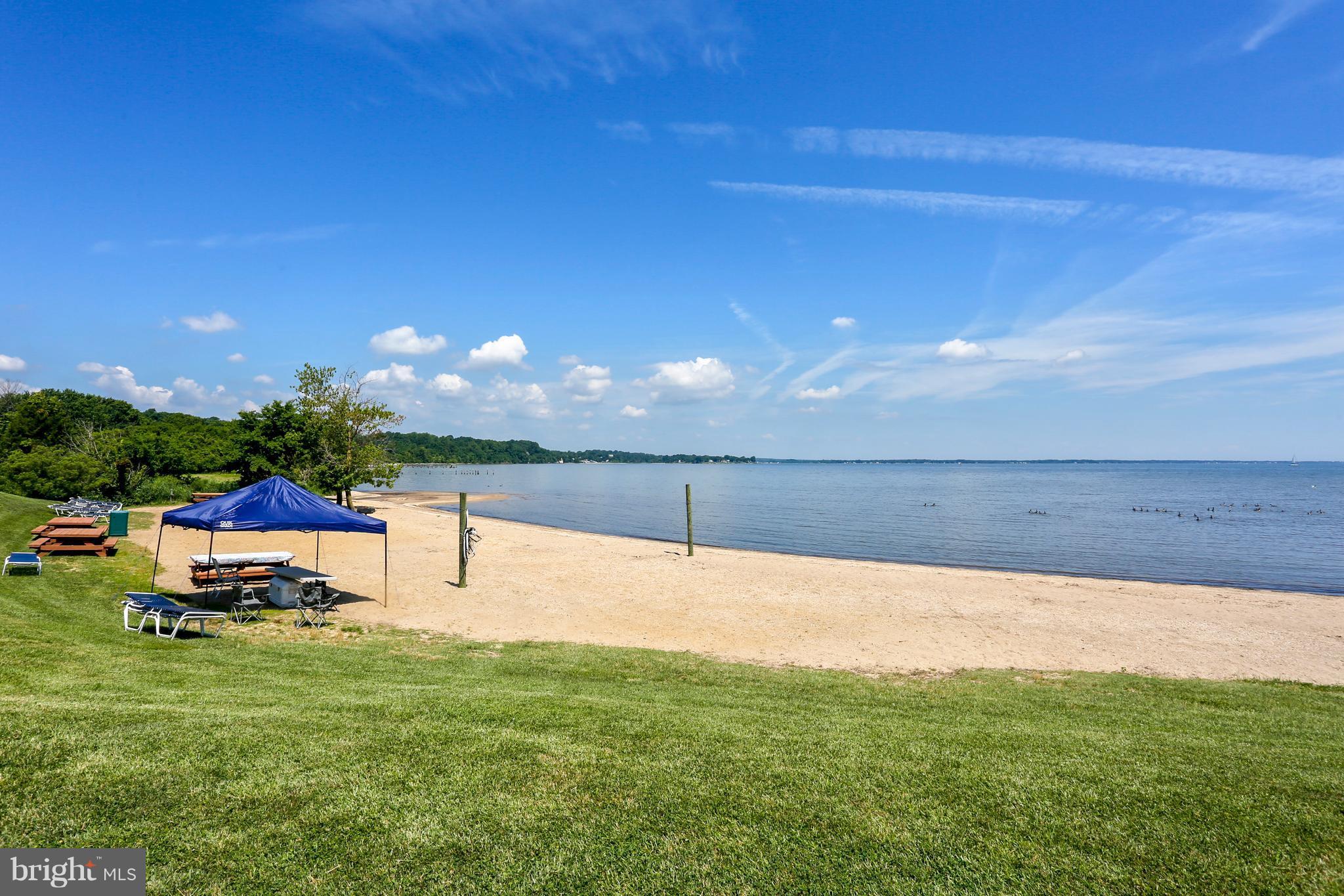 464 Friendship Road Friendship, MD 20758 - Photo 28 of 29 a view of a lake with a yard