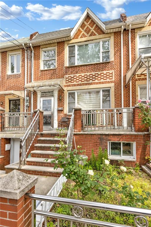 449 Ave Y Brooklyn, NY 11223 - Photo 2 of 25 a front view of a house with a yard