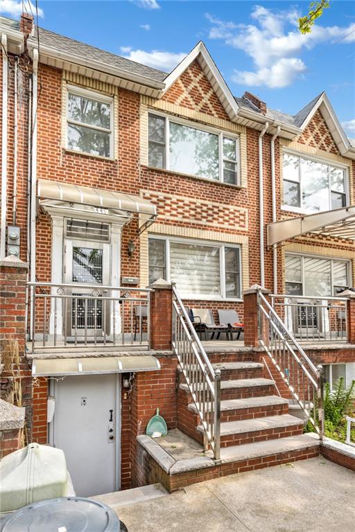 449 Ave Y Brooklyn, NY 11223 - Photo 25 of 25 a front view of a house with a yard