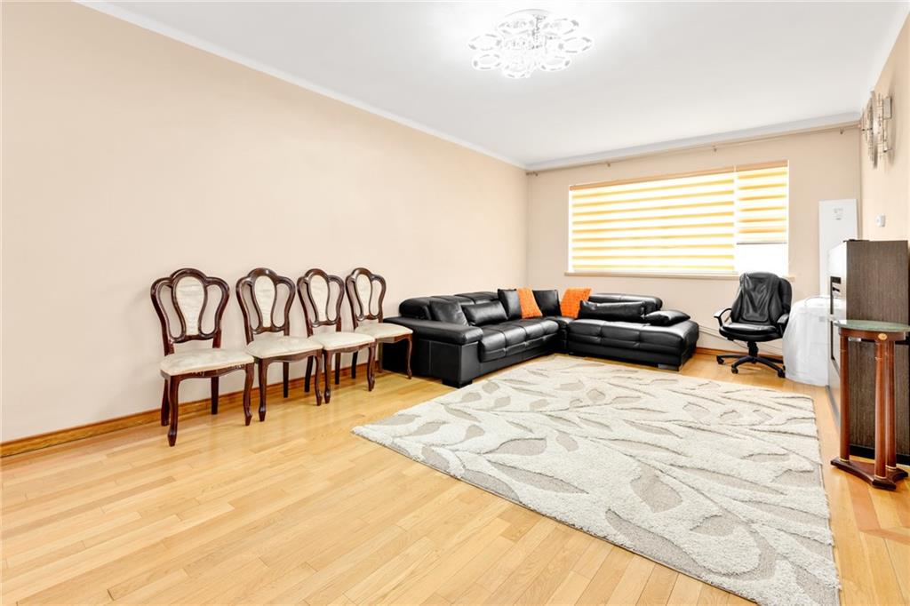 449 Ave Y Brooklyn, NY 11223 - Photo 4 of 25 a living room with furniture window and a flat screen tv