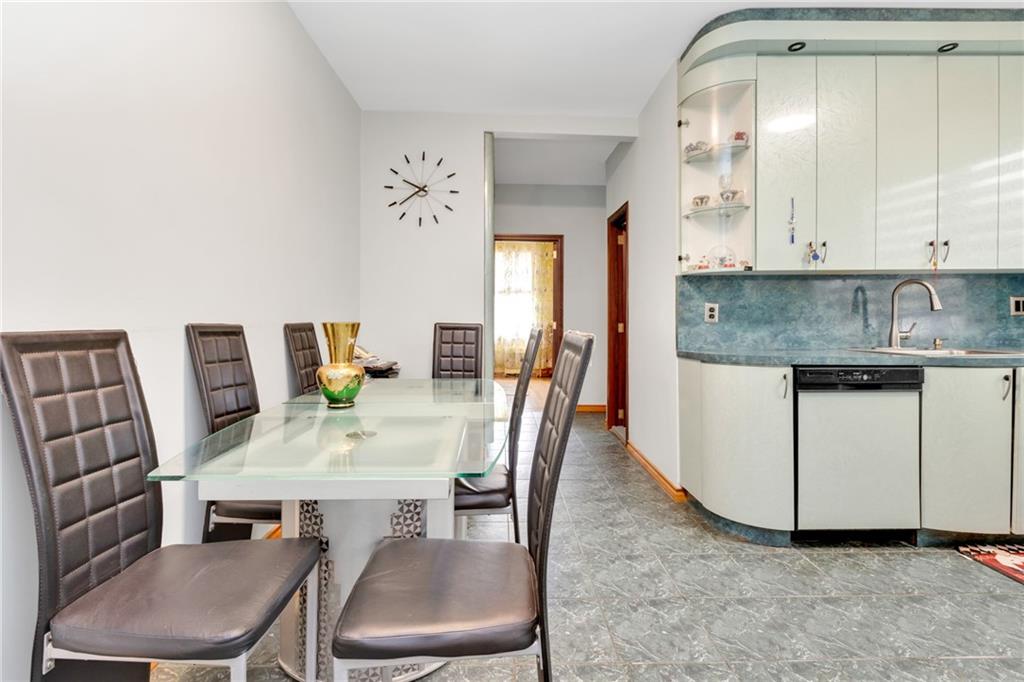 449 Ave Y Brooklyn, NY 11223 - Photo 6 of 25 a view of kitchen and dining area with furniture