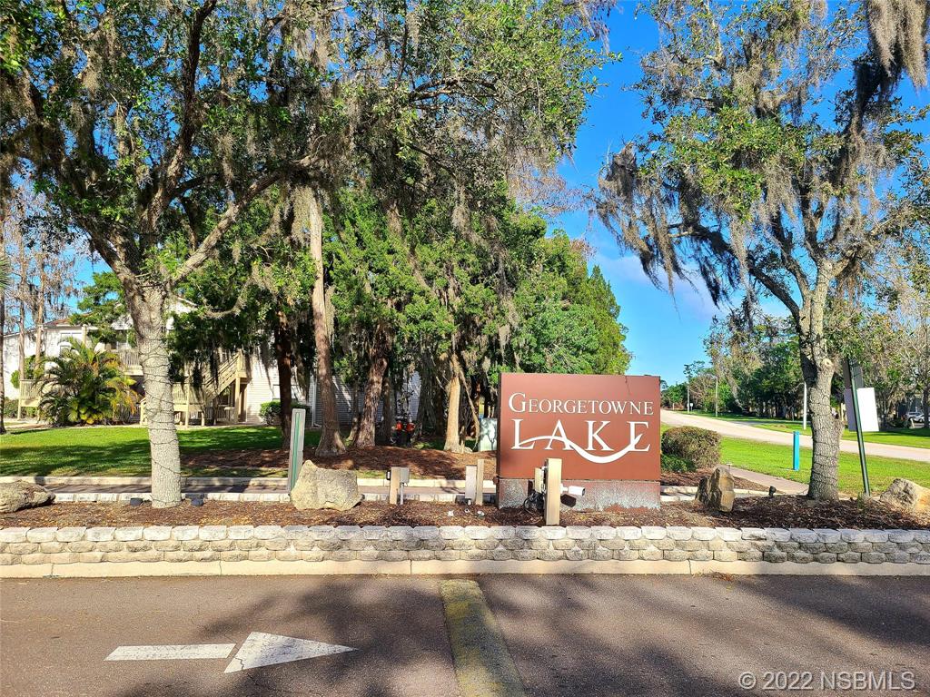 1600 Big Tree Road, Unit K3 South Daytona, FL 32119 - Photo 2 of 4 a view of a park with tree s