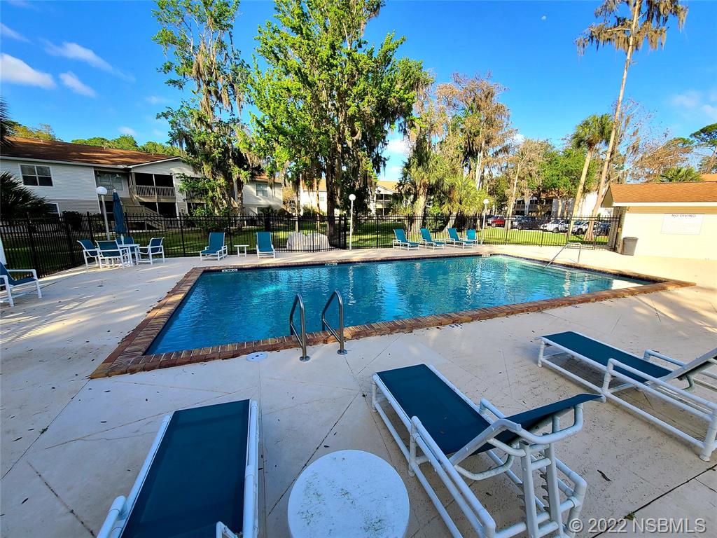 1600 Big Tree Road, Unit K3 South Daytona, FL 32119 - Photo 4 of 4 swimming pool view with a seating space