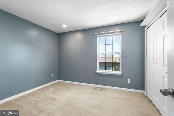 a view of hallway with a big room