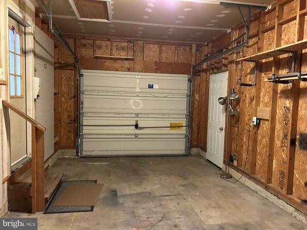 a view of a house with wooden deck