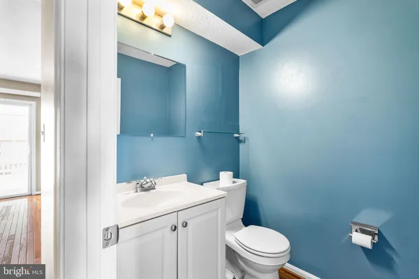 a view of an empty room with windows