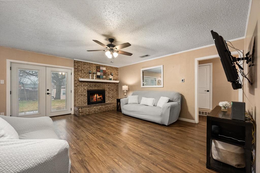 806 Ridgeway Road Joshua, TX 76058 - Photo 4 of 27 a living room with furniture and a fireplace
