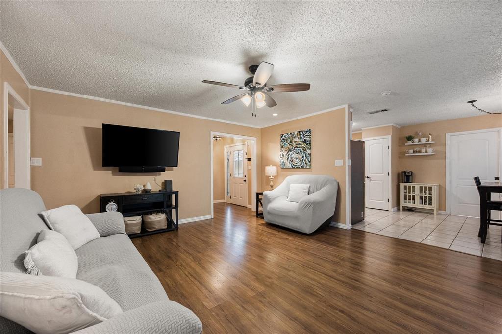 806 Ridgeway Road Joshua, TX 76058 - Photo 6 of 27 a living room with furniture and a flat screen tv