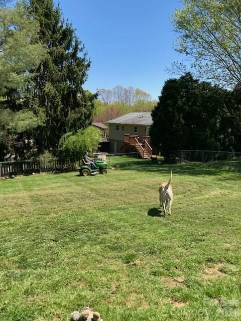 124 Oak Hill Road Candler, NC 28715 - Photo 21 of 29 a swimming pool with lots of tress in front of it