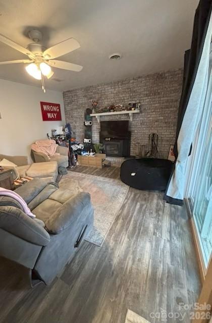 124 Oak Hill Road Candler, NC 28715 - Photo 28 of 29 a living room with furniture and a fireplace