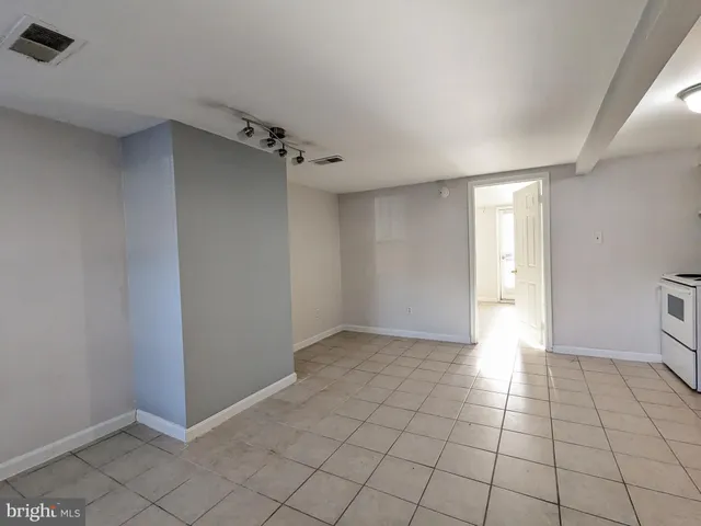 a view of an empty room and window