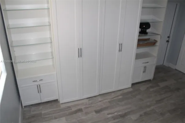 a view of an empty walk in closet