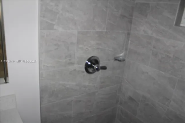 a close view of a shower in bathroom