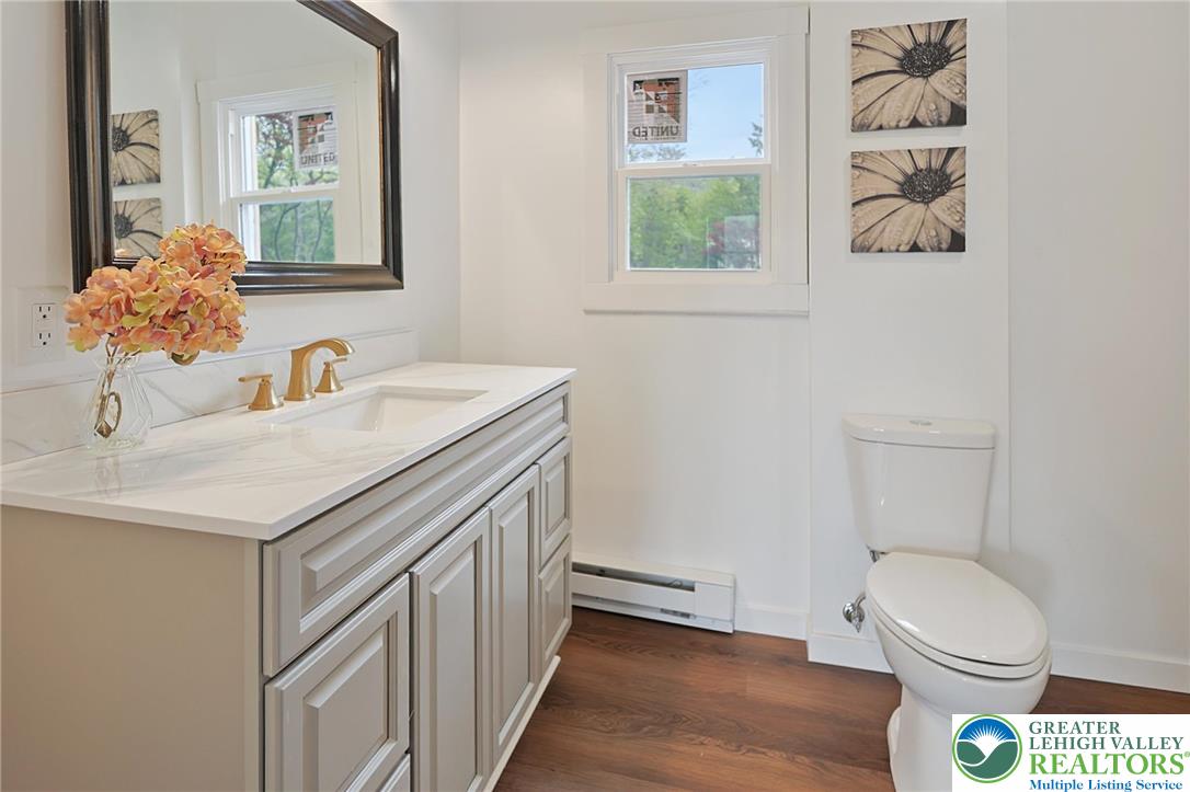 121 Ben Titus Road Tamaqua, PA 18252 - Photo 28 of 48 a bathroom with a sink a toilet and a mirror