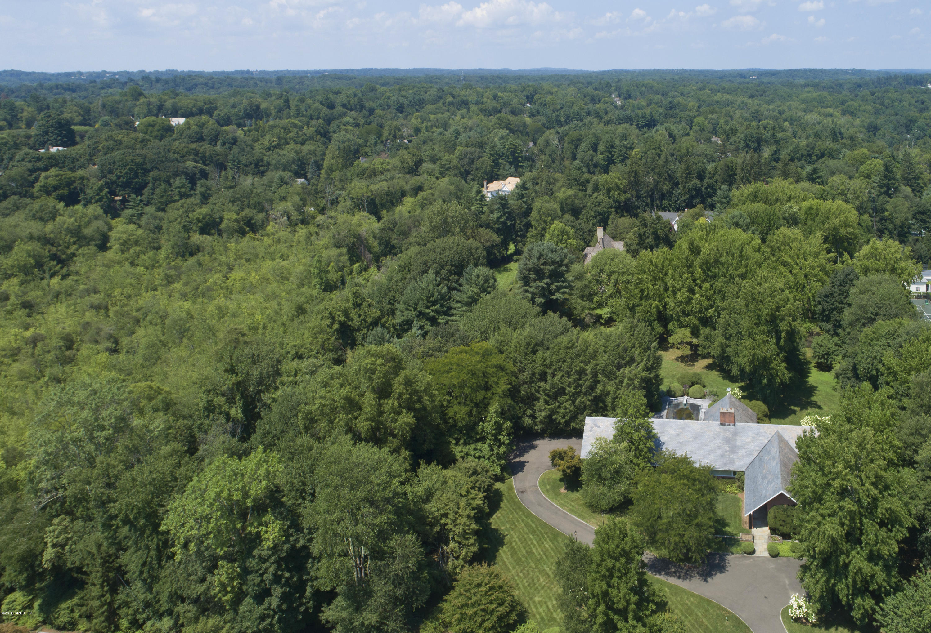 7 Dempsey Lane Greenwich, CT 06830 - Photo 20 of 22 an aerial view of a house with a yard