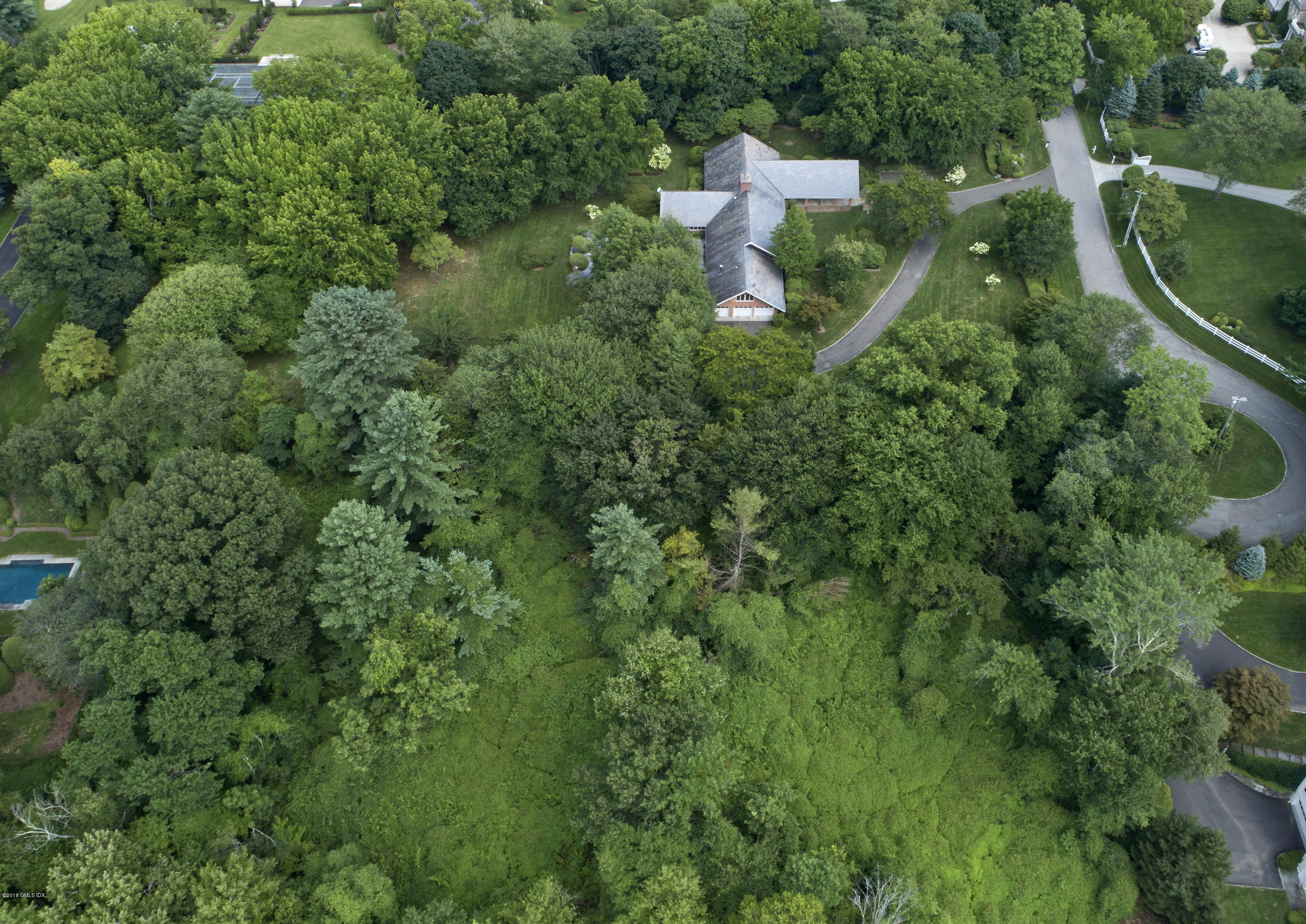 7 Dempsey Lane Greenwich, CT 06830 - Photo 22 of 22 an aerial view of a house with a yard and outdoor seating