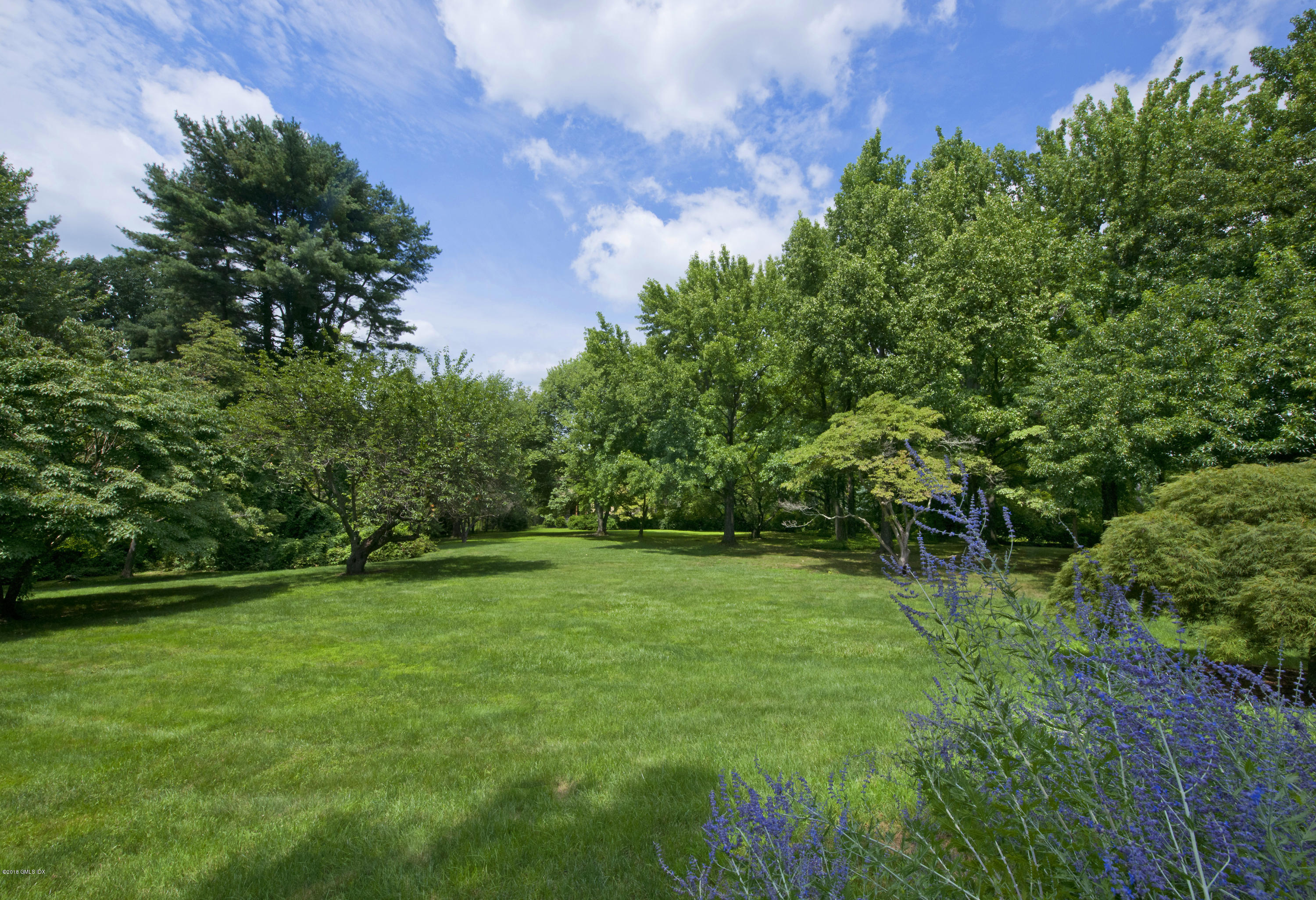 7 Dempsey Lane Greenwich, CT 06830 - Photo 4 of 22 a view of an outdoor space and a yard