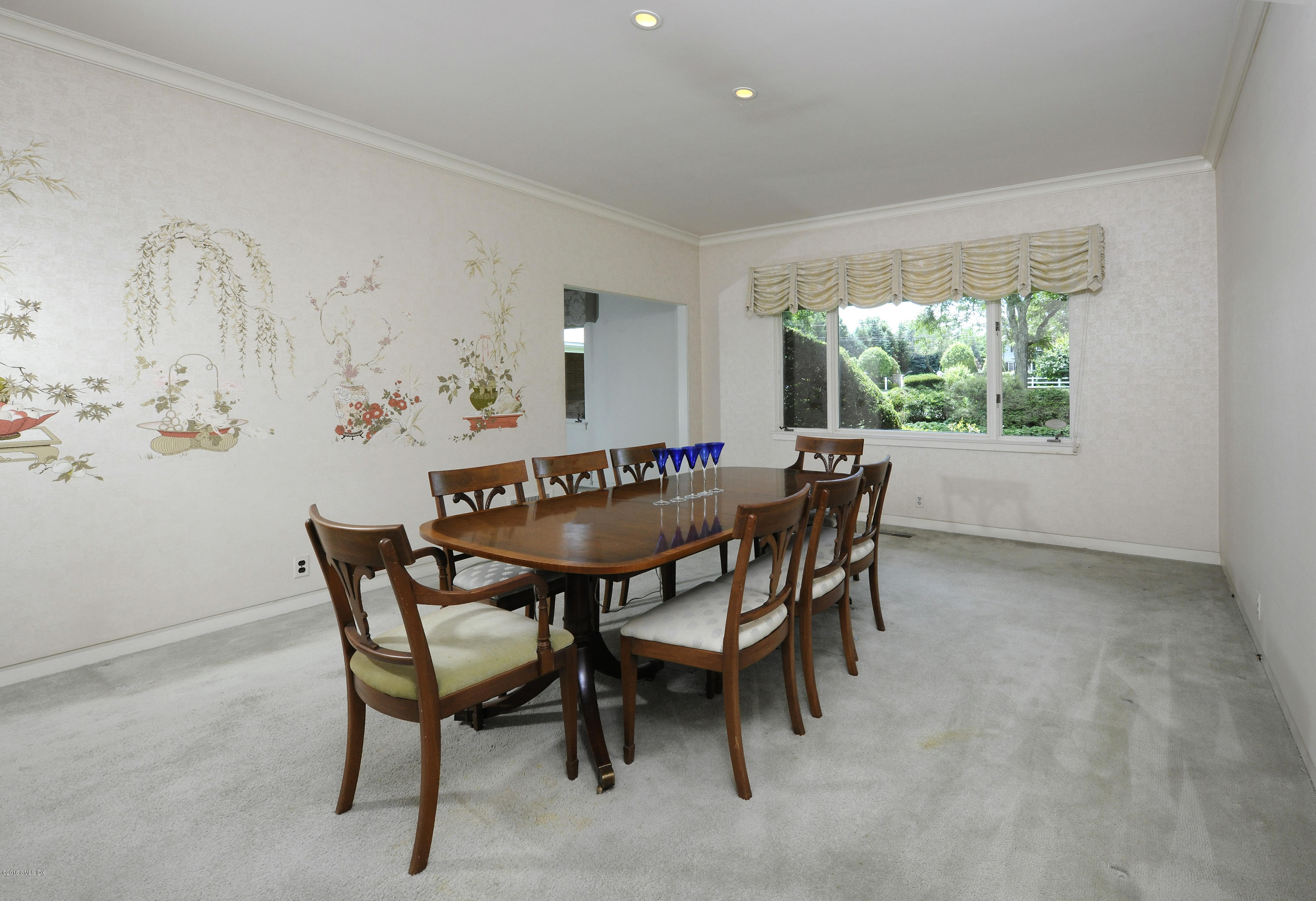 7 Dempsey Lane Greenwich, CT 06830 - Photo 10 of 22 a dining room with furniture and a floor to ceiling window